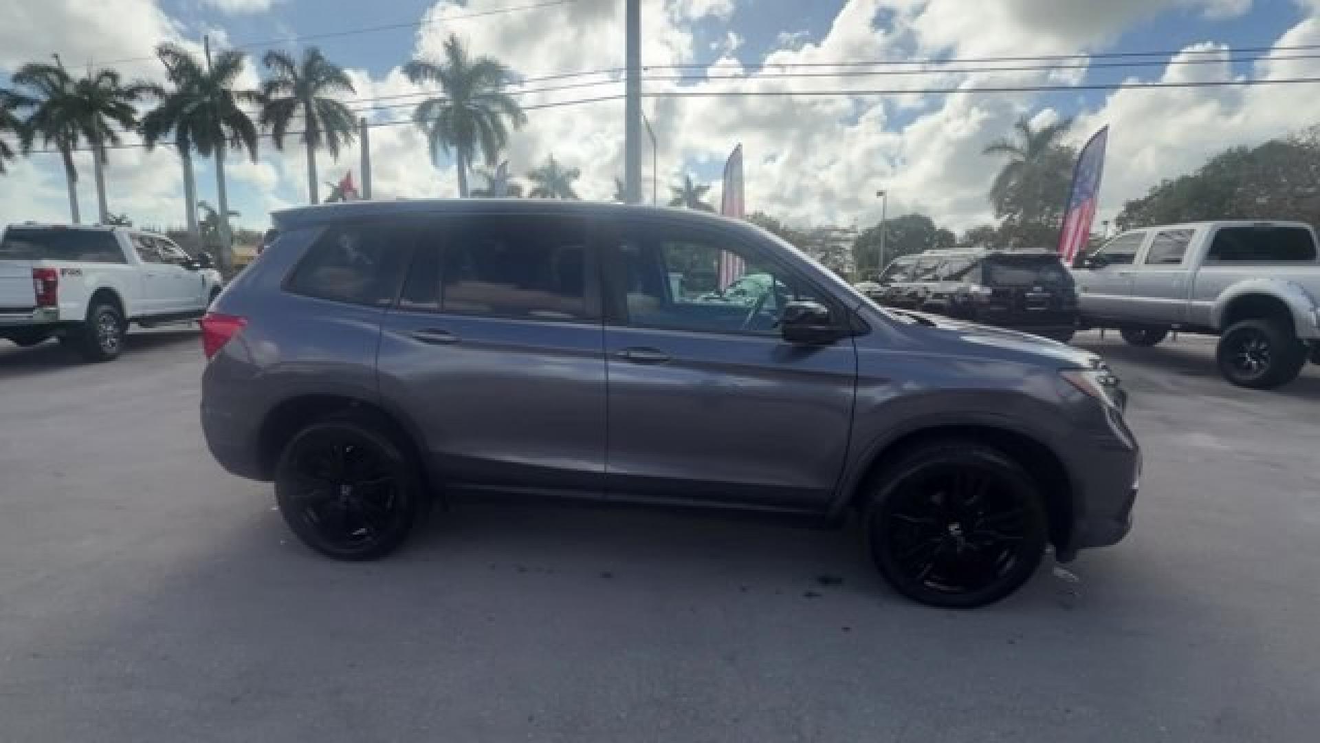2021 Gray Honda Passport (5FNYF8H24MB) with an 6 3.5 L engine, Automatic transmission, located at 27610 S Dixie Hwy, Homestead, FL, 33032, (305) 749-2348, 25.510241, -80.438301 - ALG Residual Value Awards, Residual Value Awards. Scores 24 Highway MPG and 19 City MPG! This Honda Passport delivers a Regular Unleaded V-6 3.5 L/212 engine powering this Automatic transmission. Wireless Phone Connectivity, Vehicle Stability Assist (VSA) Electronic Stability Control (ESC), Variable - Photo#5