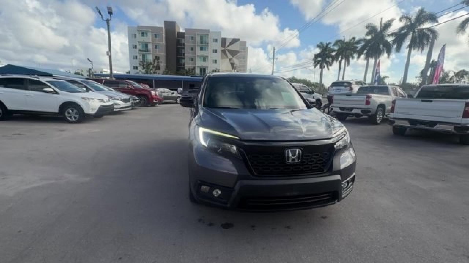 2021 Gray Honda Passport (5FNYF8H24MB) with an 6 3.5 L engine, Automatic transmission, located at 27610 S Dixie Hwy, Homestead, FL, 33032, (305) 749-2348, 25.510241, -80.438301 - ALG Residual Value Awards, Residual Value Awards. Scores 24 Highway MPG and 19 City MPG! This Honda Passport delivers a Regular Unleaded V-6 3.5 L/212 engine powering this Automatic transmission. Wireless Phone Connectivity, Vehicle Stability Assist (VSA) Electronic Stability Control (ESC), Variable - Photo#7