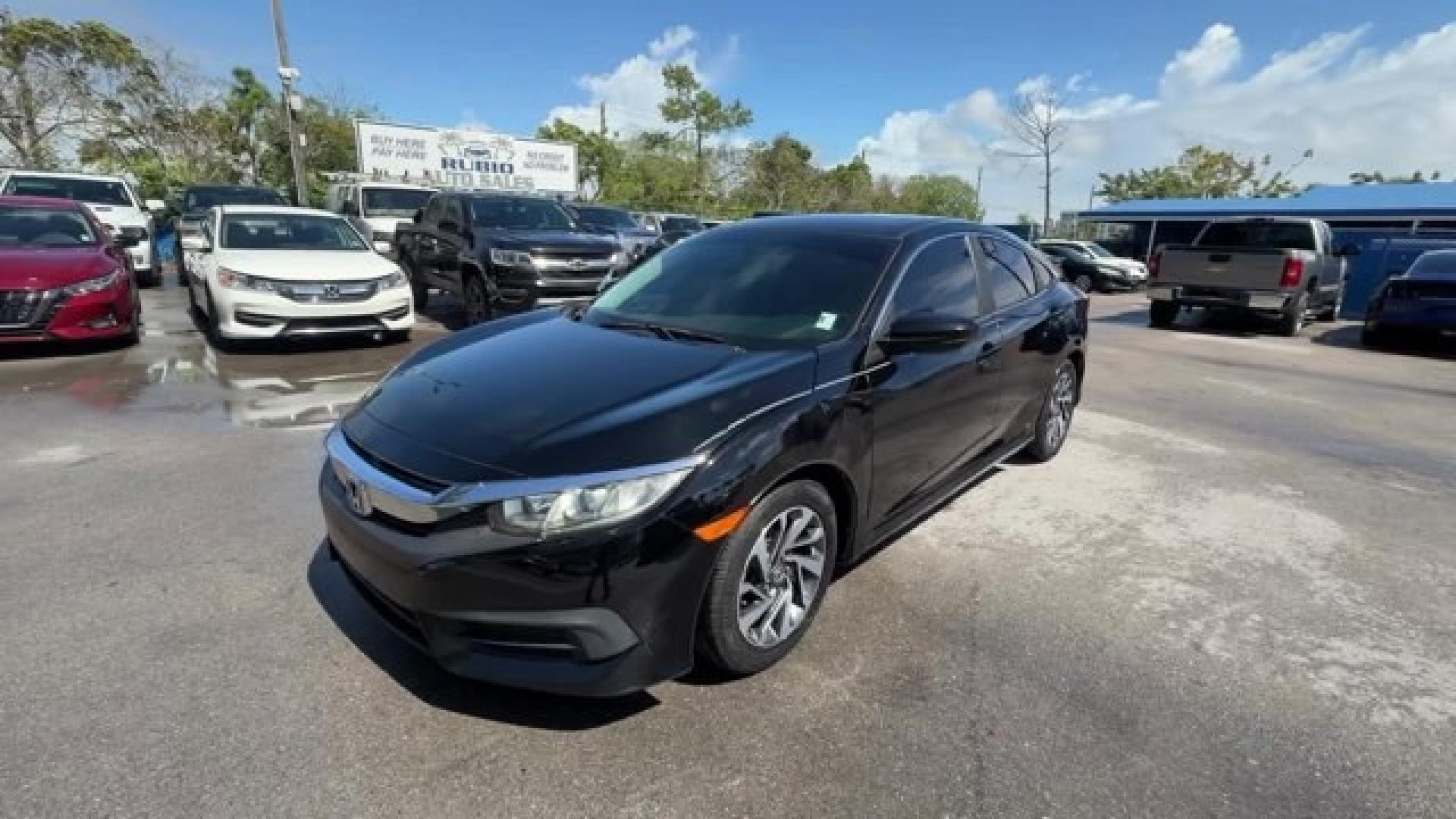 2017 Black Honda Civic Sedan (19XFC2F73HE) with an 4 2.0 L engine, Variable transmission, located at 27610 S Dixie Hwy, Homestead, FL, 33032, (305) 749-2348, 25.510241, -80.438301 - IIHS Top Safety Pick. Scores 40 Highway MPG and 31 City MPG! This Honda Civic Sedan boasts a Regular Unleaded I-4 2.0 L/122 engine powering this Variable transmission. Wireless Phone Connectivity, Window Grid Antenna, Wheels: 16 Alloy.*This Honda Civic Sedan Comes Equipped with These Options *Wheels - Photo#0