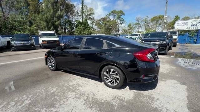 2017 Black Honda Civic Sedan (19XFC2F73HE) with an 4 2.0 L engine, Variable transmission, located at 27610 S Dixie Hwy, Homestead, FL, 33032, (305) 749-2348, 25.510241, -80.438301 - IIHS Top Safety Pick. Scores 40 Highway MPG and 31 City MPG! This Honda Civic Sedan boasts a Regular Unleaded I-4 2.0 L/122 engine powering this Variable transmission. Wireless Phone Connectivity, Window Grid Antenna, Wheels: 16 Alloy.*This Honda Civic Sedan Comes Equipped with These Options *Wheels - Photo#2