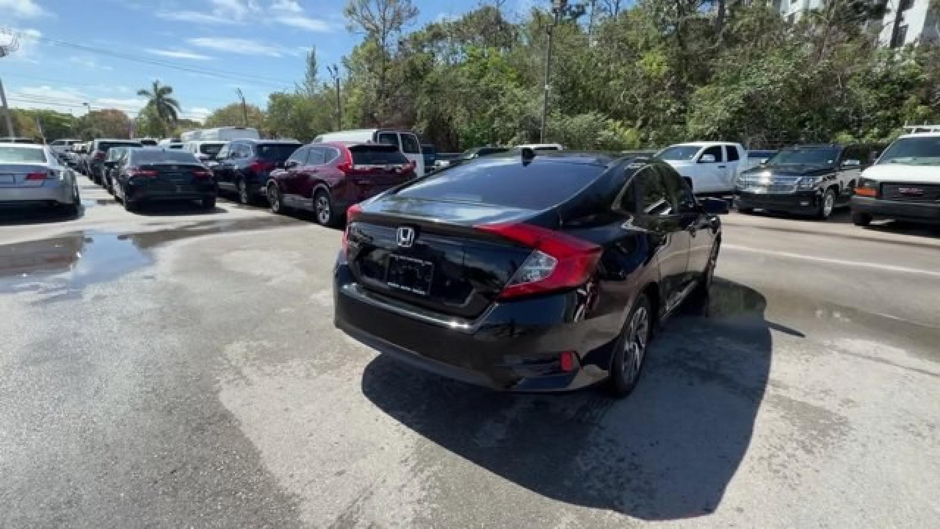 2017 Black Honda Civic Sedan (19XFC2F73HE) with an 4 2.0 L engine, Variable transmission, located at 27610 S Dixie Hwy, Homestead, FL, 33032, (305) 749-2348, 25.510241, -80.438301 - IIHS Top Safety Pick. Scores 40 Highway MPG and 31 City MPG! This Honda Civic Sedan boasts a Regular Unleaded I-4 2.0 L/122 engine powering this Variable transmission. Wireless Phone Connectivity, Window Grid Antenna, Wheels: 16 Alloy.*This Honda Civic Sedan Comes Equipped with These Options *Wheels - Photo#4
