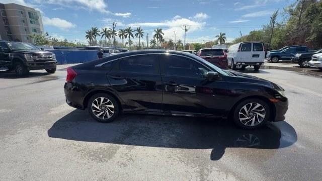 2017 Black Honda Civic Sedan (19XFC2F73HE) with an 4 2.0 L engine, Variable transmission, located at 27610 S Dixie Hwy, Homestead, FL, 33032, (305) 749-2348, 25.510241, -80.438301 - IIHS Top Safety Pick. Scores 40 Highway MPG and 31 City MPG! This Honda Civic Sedan boasts a Regular Unleaded I-4 2.0 L/122 engine powering this Variable transmission. Wireless Phone Connectivity, Window Grid Antenna, Wheels: 16 Alloy.*This Honda Civic Sedan Comes Equipped with These Options *Wheels - Photo#5