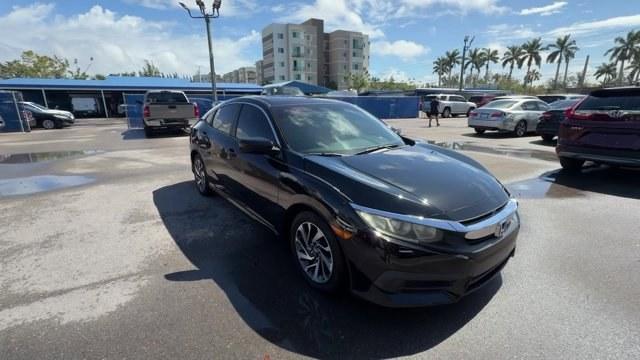 2017 Black Honda Civic Sedan (19XFC2F73HE) with an 4 2.0 L engine, Variable transmission, located at 27610 S Dixie Hwy, Homestead, FL, 33032, (305) 749-2348, 25.510241, -80.438301 - IIHS Top Safety Pick. Scores 40 Highway MPG and 31 City MPG! This Honda Civic Sedan boasts a Regular Unleaded I-4 2.0 L/122 engine powering this Variable transmission. Wireless Phone Connectivity, Window Grid Antenna, Wheels: 16 Alloy.*This Honda Civic Sedan Comes Equipped with These Options *Wheels - Photo#6