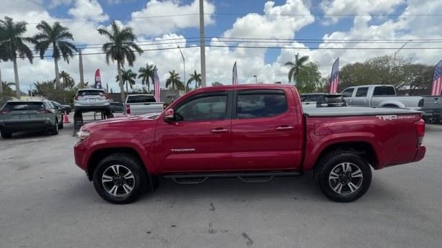 2016 Red Toyota Tacoma (5TFAZ5CN0GX) with an 6 3.5 L engine, Automatic transmission, located at 27610 S Dixie Hwy, Homestead, FL, 33032, (305) 749-2348, 25.510241, -80.438301 - KBB.com Best Resale Value Awards. Boasts 24 Highway MPG and 19 City MPG! This Toyota Tacoma boasts a Regular Unleaded V-6 3.5 L/211 engine powering this Automatic transmission. Wireless Phone Connectivity, Variable Intermittent Wipers, Trip Computer.* This Toyota Tacoma Features the Following Option - Photo#1