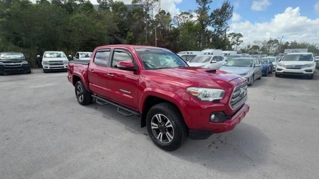 2016 Red Toyota Tacoma (5TFAZ5CN0GX) with an 6 3.5 L engine, Automatic transmission, located at 27610 S Dixie Hwy, Homestead, FL, 33032, (305) 749-2348, 25.510241, -80.438301 - KBB.com Best Resale Value Awards. Boasts 24 Highway MPG and 19 City MPG! This Toyota Tacoma boasts a Regular Unleaded V-6 3.5 L/211 engine powering this Automatic transmission. Wireless Phone Connectivity, Variable Intermittent Wipers, Trip Computer.* This Toyota Tacoma Features the Following Option - Photo#6