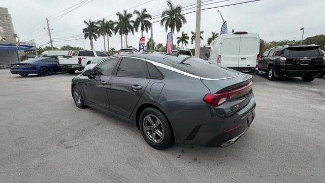 2021 Gravity Gray /Black Kia K5 (5XXG14J25MG) with an 4 1.6 L engine, Automatic transmission, located at 27610 S Dixie Hwy, Homestead, FL, 33032, (305) 749-2348, 25.510241, -80.438301 - Delivers 37 Highway MPG and 27 City MPG! This Kia K5 boasts a Intercooled Turbo Regular Unleaded I-4 1.6 L/98 engine powering this Automatic transmission. CARPETED FLOOR MATS, BLACK, CLOTH SEAT TRIM, Wireless Phone Connectivity.* This Kia K5 Features the Following Options *Window Grid Antenna, Wheel - Photo#2