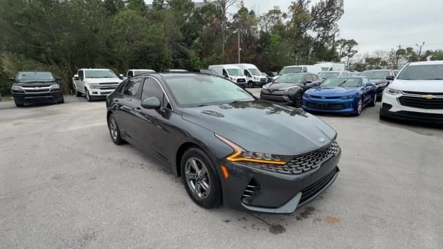 2021 Gravity Gray /Black Kia K5 (5XXG14J25MG) with an 4 1.6 L engine, Automatic transmission, located at 27610 S Dixie Hwy, Homestead, FL, 33032, (305) 749-2348, 25.510241, -80.438301 - Delivers 37 Highway MPG and 27 City MPG! This Kia K5 boasts a Intercooled Turbo Regular Unleaded I-4 1.6 L/98 engine powering this Automatic transmission. CARPETED FLOOR MATS, BLACK, CLOTH SEAT TRIM, Wireless Phone Connectivity.* This Kia K5 Features the Following Options *Window Grid Antenna, Wheel - Photo#6