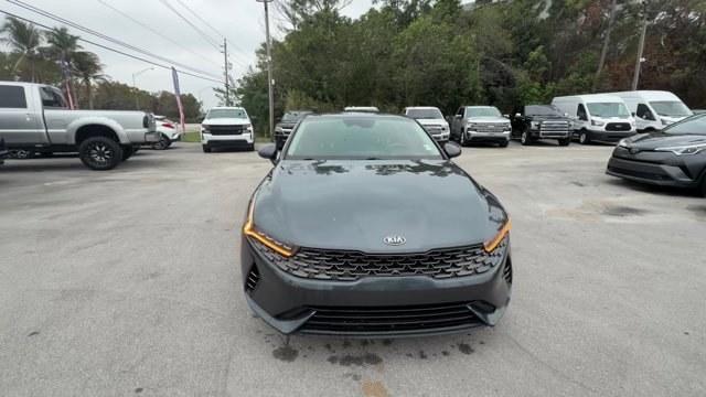 2021 Gravity Gray /Black Kia K5 (5XXG14J25MG) with an 4 1.6 L engine, Automatic transmission, located at 27610 S Dixie Hwy, Homestead, FL, 33032, (305) 749-2348, 25.510241, -80.438301 - Delivers 37 Highway MPG and 27 City MPG! This Kia K5 boasts a Intercooled Turbo Regular Unleaded I-4 1.6 L/98 engine powering this Automatic transmission. CARPETED FLOOR MATS, BLACK, CLOTH SEAT TRIM, Wireless Phone Connectivity.* This Kia K5 Features the Following Options *Window Grid Antenna, Wheel - Photo#7