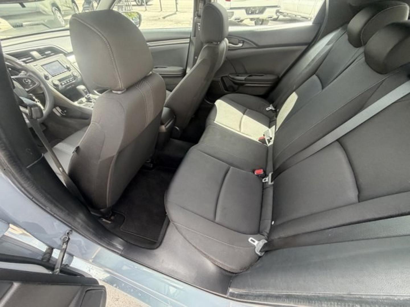 2017 Gray Honda Civic Hatchback (SHHFK7H28HU) with an 4 1.5 L engine, Variable transmission, located at 27610 S Dixie Hwy, Homestead, FL, 33032, (305) 749-2348, 25.510241, -80.438301 - KBB.com 10 Most Awarded Brands. Boasts 40 Highway MPG and 31 City MPG! This Honda Civic Hatchback delivers a Intercooled Turbo Regular Unleaded I-4 1.5 L/91 engine powering this Variable transmission. Wireless Phone Connectivity, Wheels: 16 Alloy, Wheels w/Silver Accents.*This Honda Civic Hatchback - Photo#13