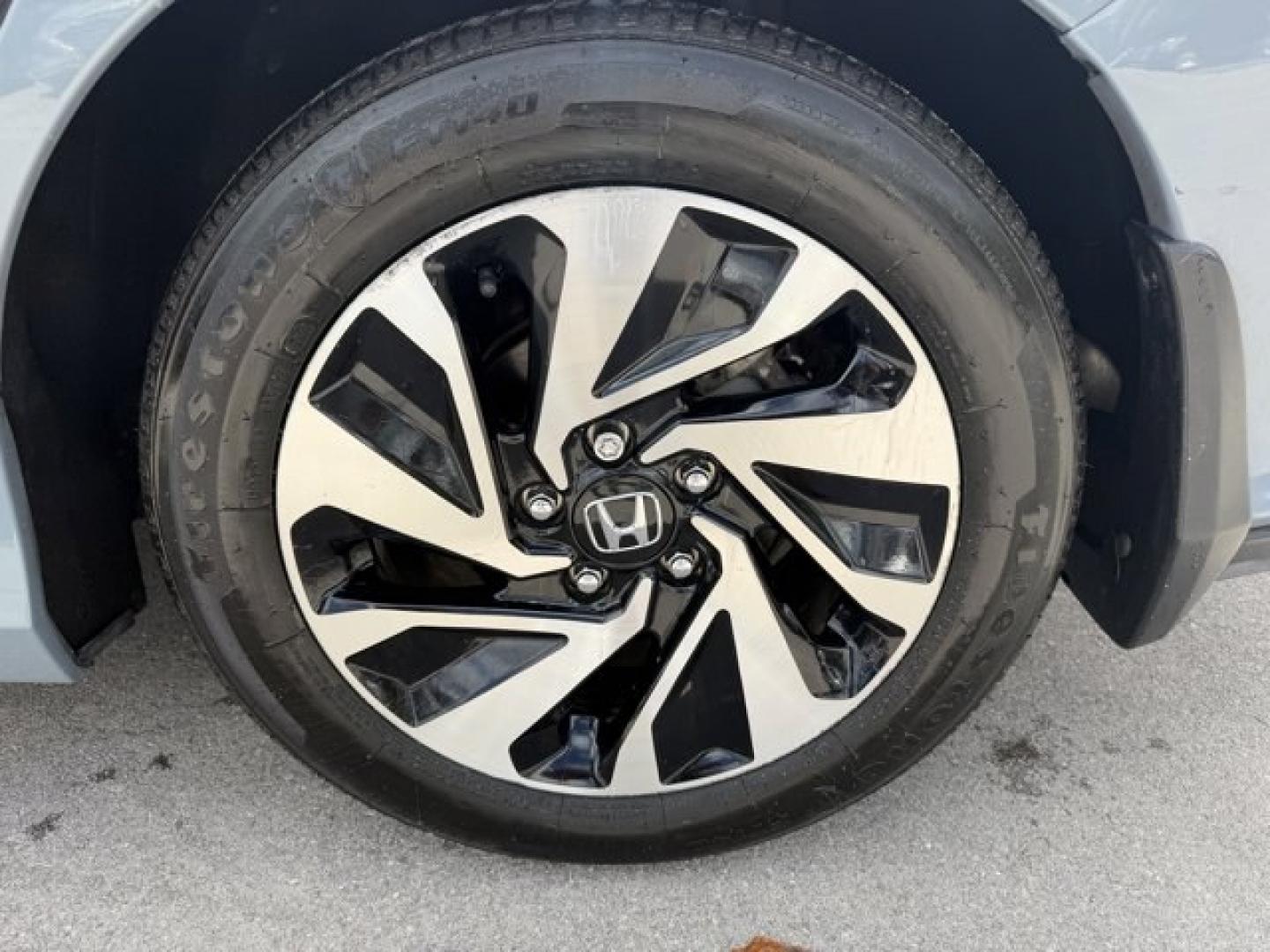 2017 Gray Honda Civic Hatchback (SHHFK7H28HU) with an 4 1.5 L engine, Variable transmission, located at 27610 S Dixie Hwy, Homestead, FL, 33032, (305) 749-2348, 25.510241, -80.438301 - KBB.com 10 Most Awarded Brands. Boasts 40 Highway MPG and 31 City MPG! This Honda Civic Hatchback delivers a Intercooled Turbo Regular Unleaded I-4 1.5 L/91 engine powering this Variable transmission. Wireless Phone Connectivity, Wheels: 16 Alloy, Wheels w/Silver Accents.*This Honda Civic Hatchback - Photo#14