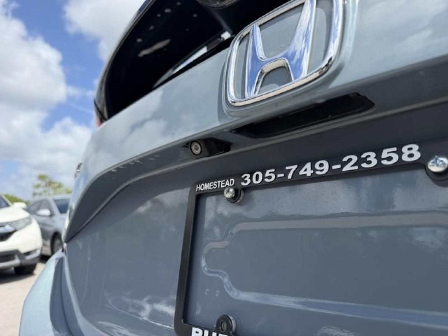 2017 Gray Honda Civic Hatchback (SHHFK7H28HU) with an 4 1.5 L engine, Variable transmission, located at 27610 S Dixie Hwy, Homestead, FL, 33032, (305) 749-2348, 25.510241, -80.438301 - KBB.com 10 Most Awarded Brands. Boasts 40 Highway MPG and 31 City MPG! This Honda Civic Hatchback delivers a Intercooled Turbo Regular Unleaded I-4 1.5 L/91 engine powering this Variable transmission. Wireless Phone Connectivity, Wheels: 16 Alloy, Wheels w/Silver Accents.*This Honda Civic Hatchback - Photo#15