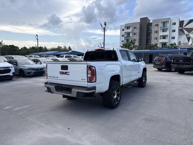 2018 Summit White /Jet Black GMC Canyon (1GTG5CEN5J1) with an 6 3.6L engine, Automatic transmission, located at 27610 S Dixie Hwy, Homestead, FL, 33032, (305) 749-2348, 25.510241, -80.438301 - Delivers 25 Highway MPG and 18 City MPG! This GMC Canyon boasts a Gas V6 3.6L/222 engine powering this Automatic transmission. WINDOW, REAR-SLIDING, MANUAL, WHEELS, 17 X 8 (43.2 CM X 20.3 CM) BLADE SILVER METALLIC CAST ALUMINUM (STD), WHEEL, SPARE, 16 X 7 (40.6 CM X 17.8 CM) STEEL.*This GMC Canyon C- Photo#4