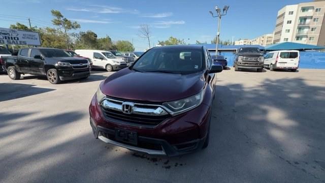 2017 Burgundy Honda CR-V (5J6RW5H33HL) with an 4 2.4 L engine, Variable transmission, located at 27610 S Dixie Hwy, Homestead, FL, 33032, (305) 749-2348, 25.510241, -80.438301 - KBB.com 10 Most Awarded Brands. Scores 32 Highway MPG and 26 City MPG! This Honda CR-V delivers a Regular Unleaded I-4 2.4 L/144 engine powering this Variable transmission. Wireless Phone Connectivity, Wheels: 17 Alloy, Valet Function.*This Honda CR-V Comes Equipped with These Options *Urethane Gear - Photo#0