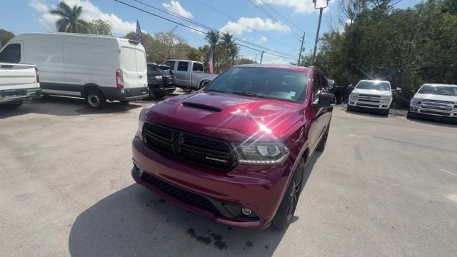2018 Octane Red Pearlcoat /Black Dodge Durango (1C4RDJDG5JC) with an 6 3.6 L engine, Automatic transmission, located at 27610 S Dixie Hwy, Homestead, FL, 33032, (305) 749-2348, 25.510241, -80.438301 - Boasts 25 Highway MPG and 18 City MPG! This Dodge Durango boasts a Regular Unleaded V-6 3.6 L/220 engine powering this Automatic transmission. TRANSMISSION: 8-SPEED AUTOMATIC (850RE) (STD), RADIO: UCONNECT 4C NAV W/8.4 DISPLAY, POWER SUNROOF.* This Dodge Durango Features the Following Options *OCTAN - Photo#0