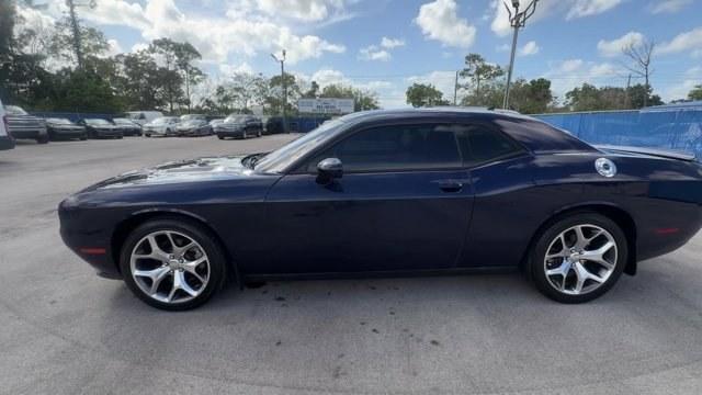2015 Jazz Blue Pearlcoat /Black Dodge Challenger (2C3CDZBG1FH) with an 6 3.6 L engine, Automatic transmission, located at 27610 S Dixie Hwy, Homestead, FL, 33032, (305) 749-2348, 25.510241, -80.438301 - KBB.com Best Buy Awards Finalist. Only 98,153 Miles! Boasts 30 Highway MPG and 19 City MPG! This Dodge Challenger boasts a Regular Unleaded V-6 3.6 L/220 engine powering this Automatic transmission. TRANSMISSION: 8-SPEED AUTOMATIC (845RE) (STD), TIRES: P245/45R20 BSW AS PERFORMANCE (STD), JAZZ BLUE - Photo#1