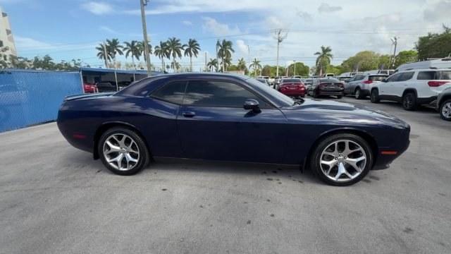 2015 Jazz Blue Pearlcoat /Black Dodge Challenger (2C3CDZBG1FH) with an 6 3.6 L engine, Automatic transmission, located at 27610 S Dixie Hwy, Homestead, FL, 33032, (305) 749-2348, 25.510241, -80.438301 - KBB.com Best Buy Awards Finalist. Only 98,153 Miles! Boasts 30 Highway MPG and 19 City MPG! This Dodge Challenger boasts a Regular Unleaded V-6 3.6 L/220 engine powering this Automatic transmission. TRANSMISSION: 8-SPEED AUTOMATIC (845RE) (STD), TIRES: P245/45R20 BSW AS PERFORMANCE (STD), JAZZ BLUE - Photo#5