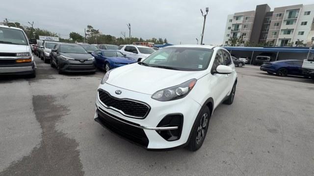 2021 Clear White /Black Kia Sportage (KNDPM3AC7M7) with an 4 2.4 L engine, Automatic transmission, located at 27610 S Dixie Hwy, Homestead, FL, 33032, (305) 749-2348, 25.510241, -80.438301 - Delivers 30 Highway MPG and 23 City MPG! This Kia Sportage delivers a Regular Unleaded I-4 2.4 L/144 engine powering this Automatic transmission. CLEAR WHITE, CARPET FLOOR MATS, BLACK, UPGRADED CLOTH SEAT TRIM -inc: YES Essentials.*This Kia Sportage Comes Equipped with These Options *BLACK, CLOTH SE - Photo#0