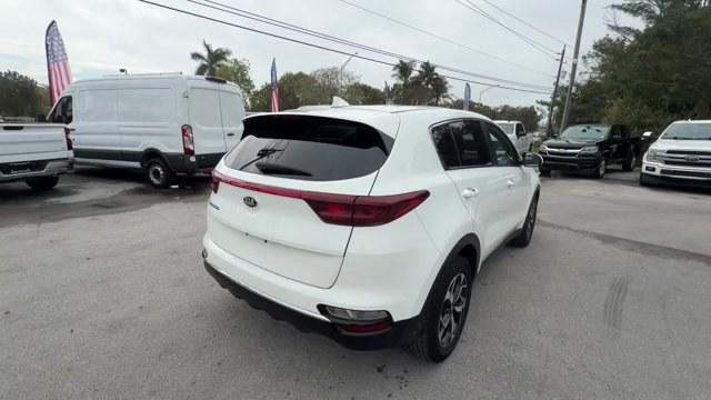 2021 Clear White /Black Kia Sportage (KNDPM3AC7M7) with an 4 2.4 L engine, Automatic transmission, located at 27610 S Dixie Hwy, Homestead, FL, 33032, (305) 749-2348, 25.510241, -80.438301 - Delivers 30 Highway MPG and 23 City MPG! This Kia Sportage delivers a Regular Unleaded I-4 2.4 L/144 engine powering this Automatic transmission. CLEAR WHITE, CARPET FLOOR MATS, BLACK, UPGRADED CLOTH SEAT TRIM -inc: YES Essentials.*This Kia Sportage Comes Equipped with These Options *BLACK, CLOTH SE - Photo#4