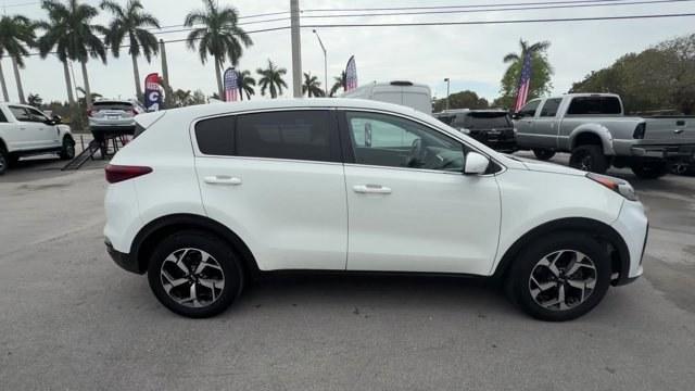 2021 Clear White /Black Kia Sportage (KNDPM3AC7M7) with an 4 2.4 L engine, Automatic transmission, located at 27610 S Dixie Hwy, Homestead, FL, 33032, (305) 749-2348, 25.510241, -80.438301 - Delivers 30 Highway MPG and 23 City MPG! This Kia Sportage delivers a Regular Unleaded I-4 2.4 L/144 engine powering this Automatic transmission. CLEAR WHITE, CARPET FLOOR MATS, BLACK, UPGRADED CLOTH SEAT TRIM -inc: YES Essentials.*This Kia Sportage Comes Equipped with These Options *BLACK, CLOTH SE - Photo#5