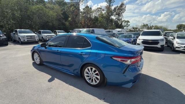 2018 Blue Toyota Camry (4T1B11HK1JU) with an 4 2.5 L engine, Automatic transmission, located at 27610 S Dixie Hwy, Homestead, FL, 33032, (305) 749-2348, 25.510241, -80.438301 - KBB.com Best Family Sedans. This Toyota Camry delivers a Regular Unleaded I-4 2.5 L/152 engine powering this Automatic transmission. Wireless Phone Connectivity, Window Grid Antenna, Variable Intermittent Wipers.* This Toyota Camry Features the Following Options *Valet Function, Trunk Rear Cargo Acc - Photo#1