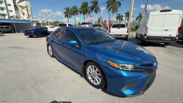 2018 Blue Toyota Camry (4T1B11HK1JU) with an 4 2.5 L engine, Automatic transmission, located at 27610 S Dixie Hwy, Homestead, FL, 33032, (305) 749-2348, 25.510241, -80.438301 - KBB.com Best Family Sedans. This Toyota Camry delivers a Regular Unleaded I-4 2.5 L/152 engine powering this Automatic transmission. Wireless Phone Connectivity, Window Grid Antenna, Variable Intermittent Wipers.* This Toyota Camry Features the Following Options *Valet Function, Trunk Rear Cargo Acc - Photo#6