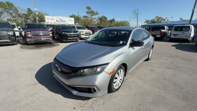 2019 Silver Honda Civic Sedan (19XFC2F6XKE) with an 4 2.0 L engine, Variable transmission, located at 27610 S Dixie Hwy, Homestead, FL, 33032, (305) 749-2348, 25.510241, -80.438301 - Boasts 38 Highway MPG and 30 City MPG! This Honda Civic Sedan boasts a Regular Unleaded I-4 2.0 L/122 engine powering this Variable transmission. Wireless Phone Connectivity, Window Grid Antenna, Wheels: 16 w/Full Covers.* This Honda Civic Sedan Features the Following Options *Wheels w/Full Wheel Co - Photo#0