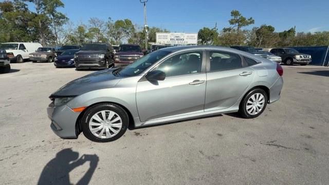 2019 Silver Honda Civic Sedan (19XFC2F6XKE) with an 4 2.0 L engine, Variable transmission, located at 27610 S Dixie Hwy, Homestead, FL, 33032, (305) 749-2348, 25.510241, -80.438301 - Boasts 38 Highway MPG and 30 City MPG! This Honda Civic Sedan boasts a Regular Unleaded I-4 2.0 L/122 engine powering this Variable transmission. Wireless Phone Connectivity, Window Grid Antenna, Wheels: 16 w/Full Covers.* This Honda Civic Sedan Features the Following Options *Wheels w/Full Wheel Co - Photo#1