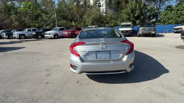 2019 Silver Honda Civic Sedan (19XFC2F6XKE) with an 4 2.0 L engine, Variable transmission, located at 27610 S Dixie Hwy, Homestead, FL, 33032, (305) 749-2348, 25.510241, -80.438301 - Boasts 38 Highway MPG and 30 City MPG! This Honda Civic Sedan boasts a Regular Unleaded I-4 2.0 L/122 engine powering this Variable transmission. Wireless Phone Connectivity, Window Grid Antenna, Wheels: 16 w/Full Covers.* This Honda Civic Sedan Features the Following Options *Wheels w/Full Wheel Co - Photo#3