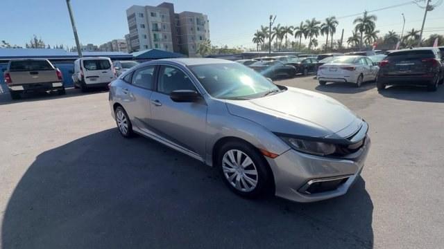 2019 Silver Honda Civic Sedan (19XFC2F6XKE) with an 4 2.0 L engine, Variable transmission, located at 27610 S Dixie Hwy, Homestead, FL, 33032, (305) 749-2348, 25.510241, -80.438301 - Boasts 38 Highway MPG and 30 City MPG! This Honda Civic Sedan boasts a Regular Unleaded I-4 2.0 L/122 engine powering this Variable transmission. Wireless Phone Connectivity, Window Grid Antenna, Wheels: 16 w/Full Covers.* This Honda Civic Sedan Features the Following Options *Wheels w/Full Wheel Co - Photo#6