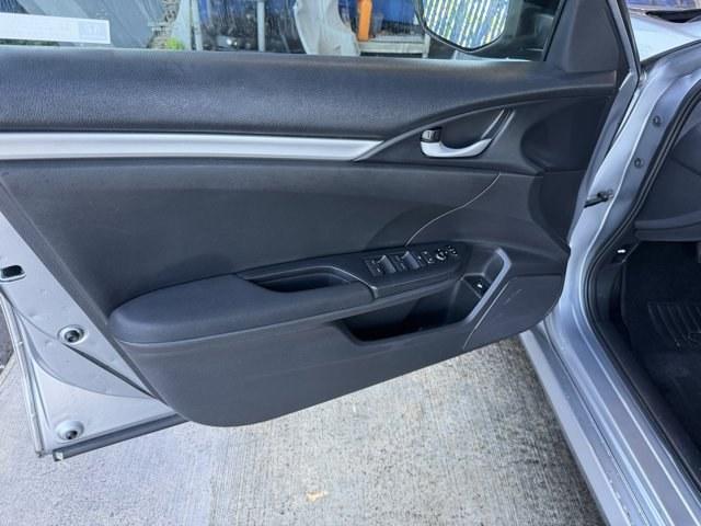 2019 Silver Honda Civic Sedan (19XFC2F6XKE) with an 4 2.0 L engine, Variable transmission, located at 27610 S Dixie Hwy, Homestead, FL, 33032, (305) 749-2348, 25.510241, -80.438301 - Boasts 38 Highway MPG and 30 City MPG! This Honda Civic Sedan boasts a Regular Unleaded I-4 2.0 L/122 engine powering this Variable transmission. Wireless Phone Connectivity, Window Grid Antenna, Wheels: 16 w/Full Covers.* This Honda Civic Sedan Features the Following Options *Wheels w/Full Wheel Co - Photo#12