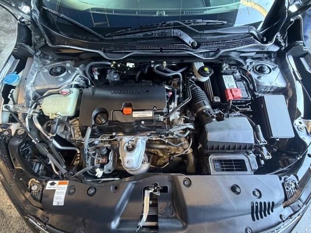 2019 Silver Honda Civic Sedan (19XFC2F6XKE) with an 4 2.0 L engine, Variable transmission, located at 27610 S Dixie Hwy, Homestead, FL, 33032, (305) 749-2348, 25.510241, -80.438301 - Boasts 38 Highway MPG and 30 City MPG! This Honda Civic Sedan boasts a Regular Unleaded I-4 2.0 L/122 engine powering this Variable transmission. Wireless Phone Connectivity, Window Grid Antenna, Wheels: 16 w/Full Covers.* This Honda Civic Sedan Features the Following Options *Wheels w/Full Wheel Co - Photo#15