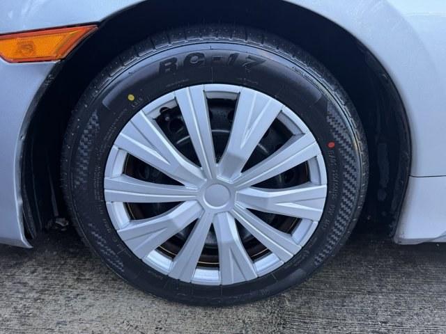 2019 Silver Honda Civic Sedan (19XFC2F6XKE) with an 4 2.0 L engine, Variable transmission, located at 27610 S Dixie Hwy, Homestead, FL, 33032, (305) 749-2348, 25.510241, -80.438301 - Boasts 38 Highway MPG and 30 City MPG! This Honda Civic Sedan boasts a Regular Unleaded I-4 2.0 L/122 engine powering this Variable transmission. Wireless Phone Connectivity, Window Grid Antenna, Wheels: 16 w/Full Covers.* This Honda Civic Sedan Features the Following Options *Wheels w/Full Wheel Co - Photo#16