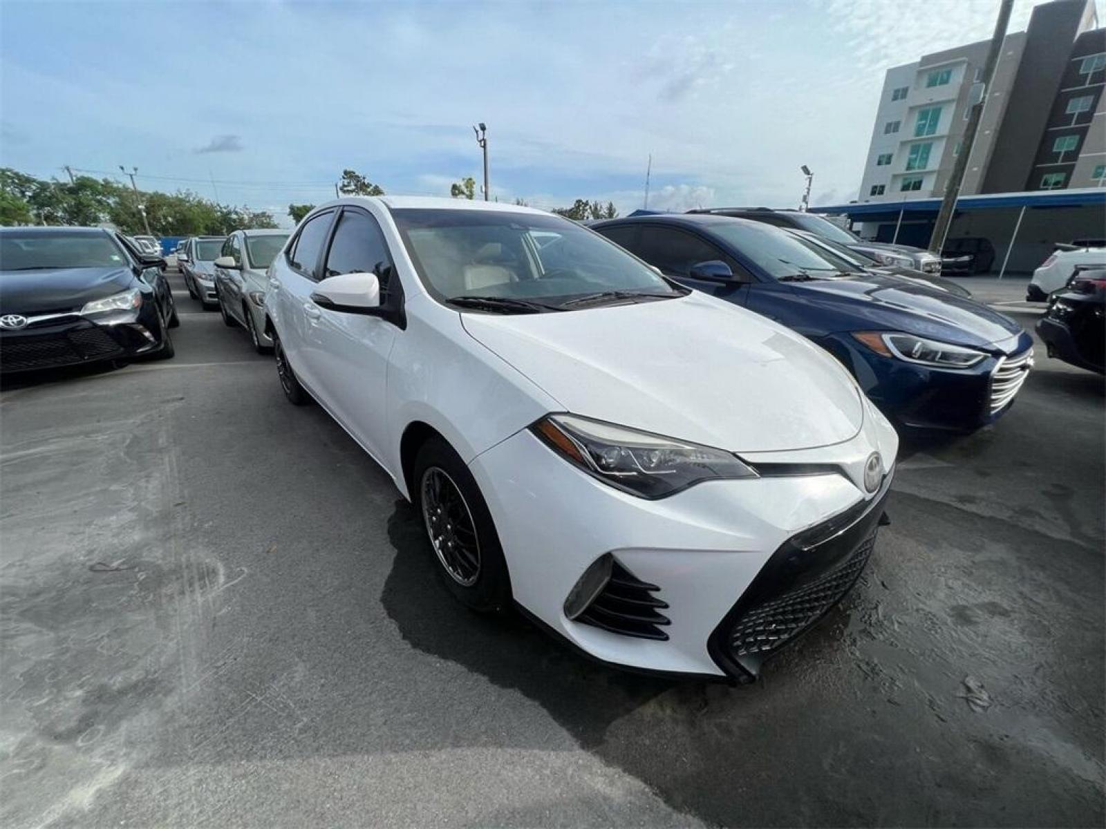 2017 Super White Toyota Corolla L (2T1BURHE8HC) with an 1.8L I4 DOHC engine, CVT transmission, located at 27610 S Dixie Hwy, Homestead, FL, 33032, (305) 749-2348, 25.510241, -80.438301 - Photo #0