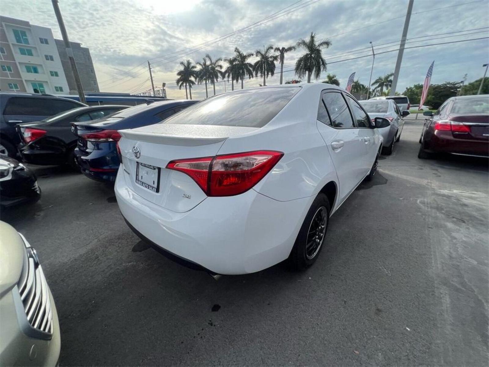 2017 Super White Toyota Corolla L (2T1BURHE8HC) with an 1.8L I4 DOHC engine, CVT transmission, located at 27610 S Dixie Hwy, Homestead, FL, 33032, (305) 749-2348, 25.510241, -80.438301 - Photo #2