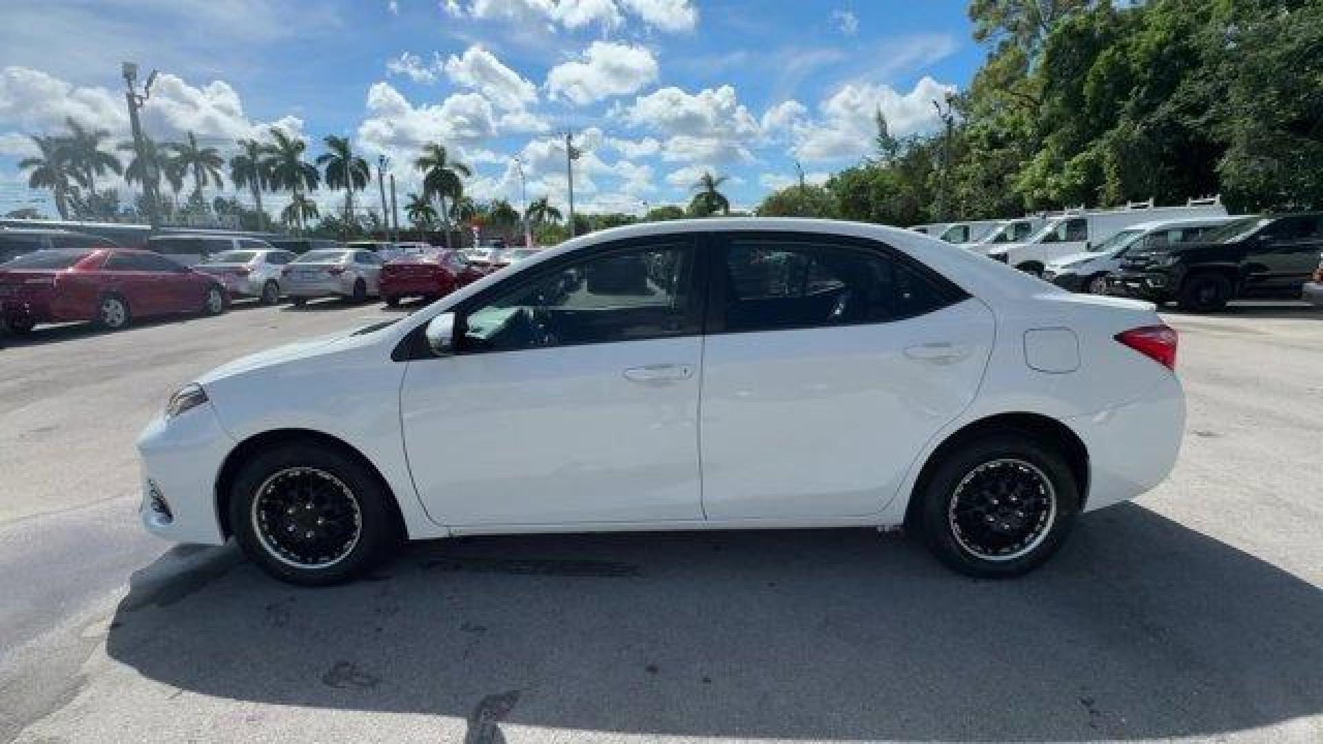 2017 White Toyota Corolla L (2T1BURHE8HC) with an 4 1.8 L engine, Variable transmission, located at 27610 S Dixie Hwy, Homestead, FL, 33032, (305) 749-2348, 25.510241, -80.438301 - KBB.com 5-Year Cost to Own Awards. This Toyota Corolla delivers a Regular Unleaded I-4 1.8 L/110 engine powering this Variable transmission. Urethane Gear Shifter Material, Trunk Rear Cargo Access, Trip Computer.* This Toyota Corolla Features the Following Options *Transmission: Continuously Variabl - Photo#1
