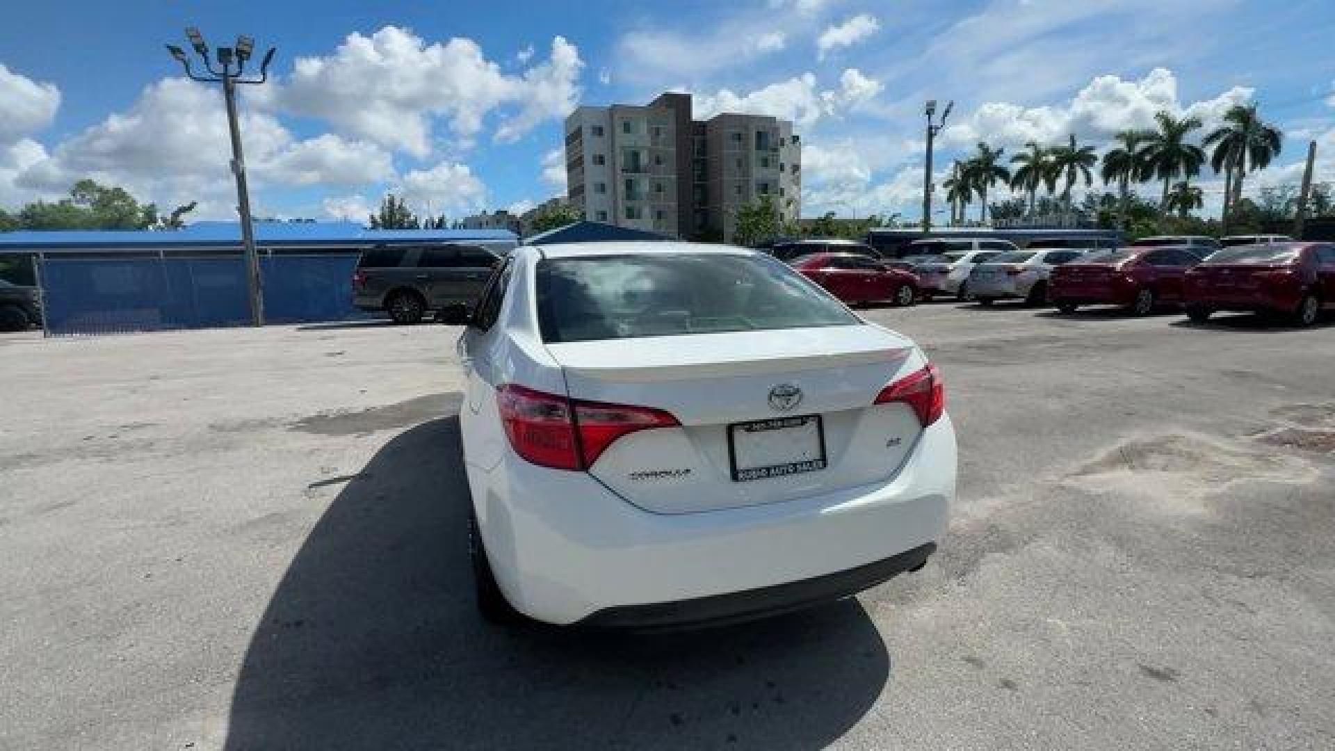 2017 White Toyota Corolla L (2T1BURHE8HC) with an 4 1.8 L engine, Variable transmission, located at 27610 S Dixie Hwy, Homestead, FL, 33032, (305) 749-2348, 25.510241, -80.438301 - KBB.com 5-Year Cost to Own Awards. This Toyota Corolla delivers a Regular Unleaded I-4 1.8 L/110 engine powering this Variable transmission. Urethane Gear Shifter Material, Trunk Rear Cargo Access, Trip Computer.* This Toyota Corolla Features the Following Options *Transmission: Continuously Variabl - Photo#3
