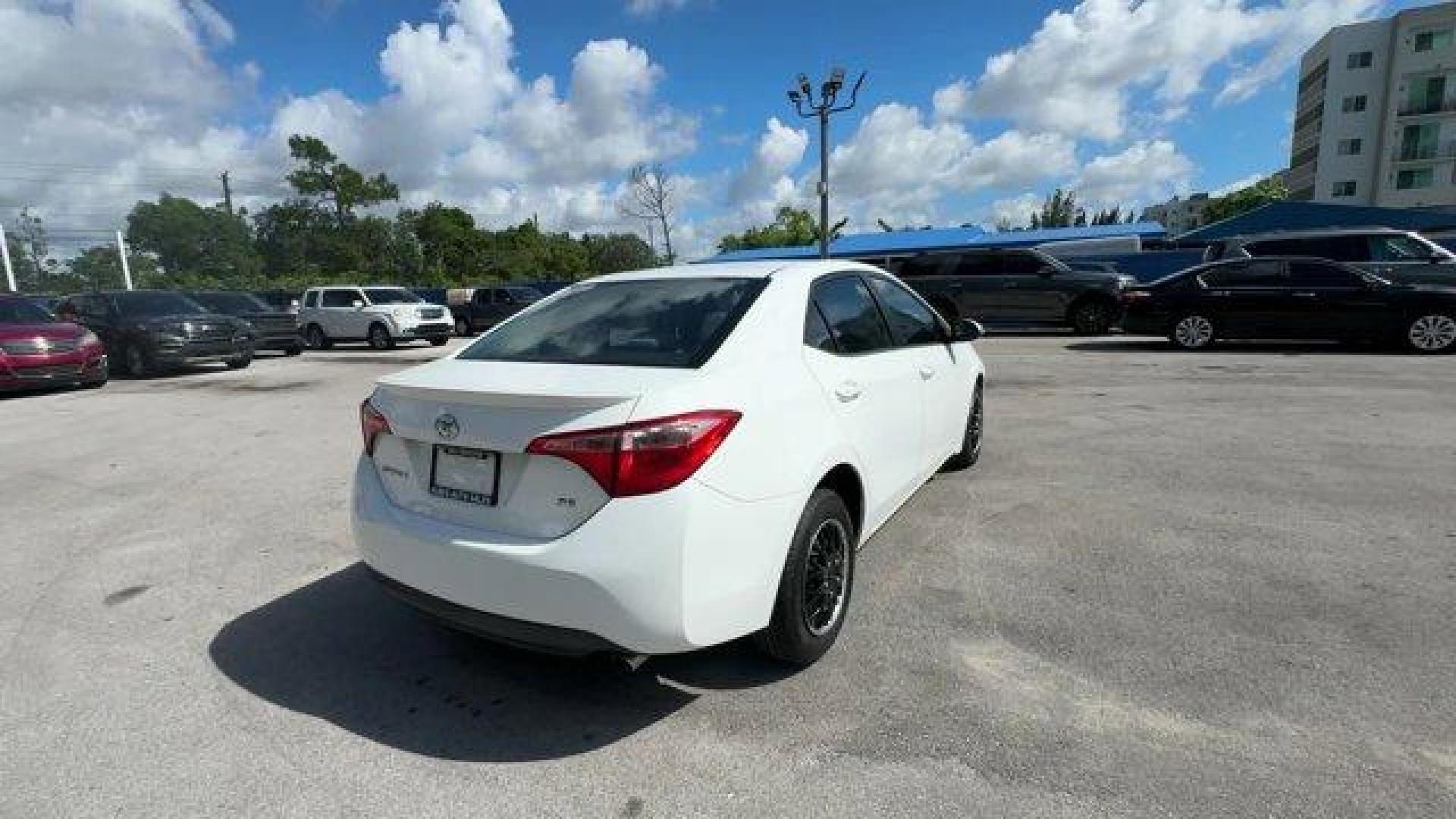2017 White Toyota Corolla L (2T1BURHE8HC) with an 4 1.8 L engine, Variable transmission, located at 27610 S Dixie Hwy, Homestead, FL, 33032, (305) 749-2348, 25.510241, -80.438301 - KBB.com 5-Year Cost to Own Awards. This Toyota Corolla delivers a Regular Unleaded I-4 1.8 L/110 engine powering this Variable transmission. Urethane Gear Shifter Material, Trunk Rear Cargo Access, Trip Computer.* This Toyota Corolla Features the Following Options *Transmission: Continuously Variabl - Photo#4