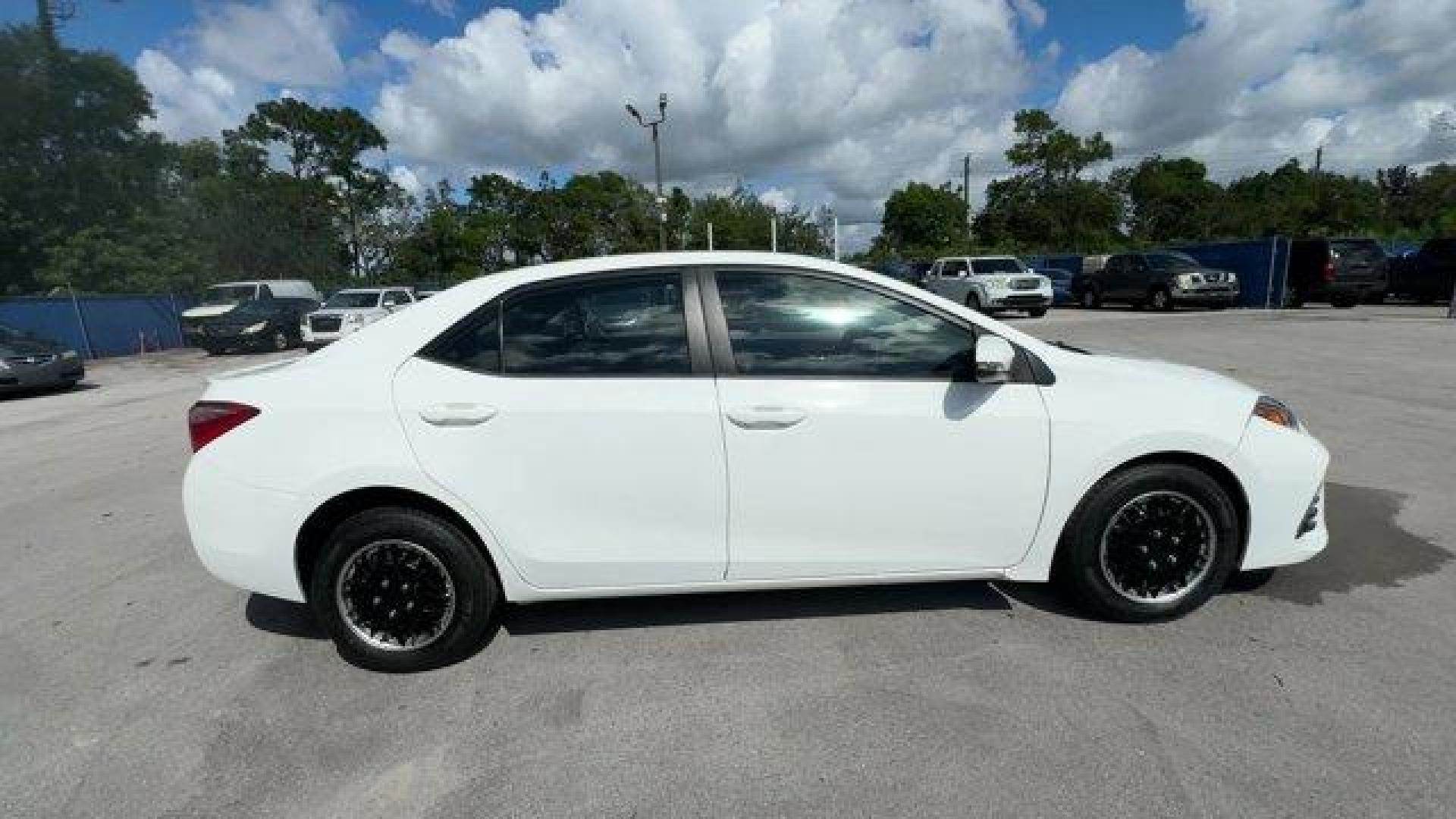 2017 White Toyota Corolla L (2T1BURHE8HC) with an 4 1.8 L engine, Variable transmission, located at 27610 S Dixie Hwy, Homestead, FL, 33032, (305) 749-2348, 25.510241, -80.438301 - KBB.com 5-Year Cost to Own Awards. This Toyota Corolla delivers a Regular Unleaded I-4 1.8 L/110 engine powering this Variable transmission. Urethane Gear Shifter Material, Trunk Rear Cargo Access, Trip Computer.* This Toyota Corolla Features the Following Options *Transmission: Continuously Variabl - Photo#5