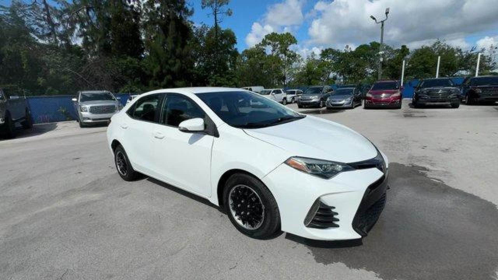 2017 White Toyota Corolla L (2T1BURHE8HC) with an 4 1.8 L engine, Variable transmission, located at 27610 S Dixie Hwy, Homestead, FL, 33032, (305) 749-2348, 25.510241, -80.438301 - KBB.com 5-Year Cost to Own Awards. This Toyota Corolla delivers a Regular Unleaded I-4 1.8 L/110 engine powering this Variable transmission. Urethane Gear Shifter Material, Trunk Rear Cargo Access, Trip Computer.* This Toyota Corolla Features the Following Options *Transmission: Continuously Variabl - Photo#6
