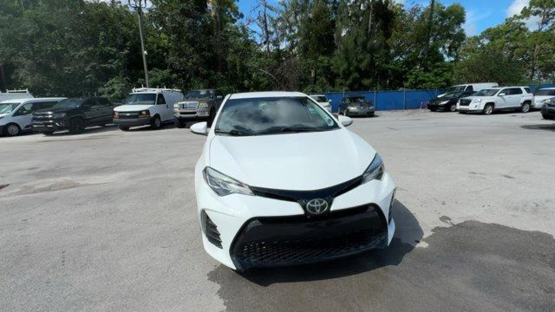 2017 White Toyota Corolla L (2T1BURHE8HC) with an 4 1.8 L engine, Variable transmission, located at 27610 S Dixie Hwy, Homestead, FL, 33032, (305) 749-2348, 25.510241, -80.438301 - KBB.com 5-Year Cost to Own Awards. This Toyota Corolla delivers a Regular Unleaded I-4 1.8 L/110 engine powering this Variable transmission. Urethane Gear Shifter Material, Trunk Rear Cargo Access, Trip Computer.* This Toyota Corolla Features the Following Options *Transmission: Continuously Variabl - Photo#7