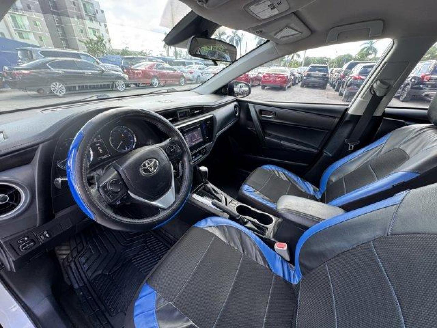 2017 White Toyota Corolla L (2T1BURHE8HC) with an 4 1.8 L engine, Variable transmission, located at 27610 S Dixie Hwy, Homestead, FL, 33032, (305) 749-2348, 25.510241, -80.438301 - KBB.com 5-Year Cost to Own Awards. This Toyota Corolla delivers a Regular Unleaded I-4 1.8 L/110 engine powering this Variable transmission. Urethane Gear Shifter Material, Trunk Rear Cargo Access, Trip Computer.* This Toyota Corolla Features the Following Options *Transmission: Continuously Variabl - Photo#10