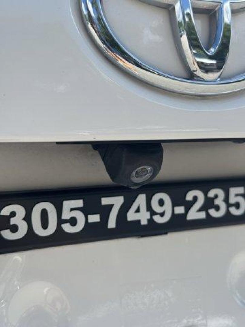 2017 White Toyota Corolla L (2T1BURHE8HC) with an 4 1.8 L engine, Variable transmission, located at 27610 S Dixie Hwy, Homestead, FL, 33032, (305) 749-2348, 25.510241, -80.438301 - KBB.com 5-Year Cost to Own Awards. This Toyota Corolla delivers a Regular Unleaded I-4 1.8 L/110 engine powering this Variable transmission. Urethane Gear Shifter Material, Trunk Rear Cargo Access, Trip Computer.* This Toyota Corolla Features the Following Options *Transmission: Continuously Variabl - Photo#19