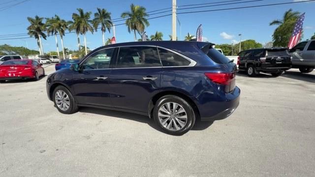 2014 Blue Acura MDX (5FRYD4H49EB) with an 6 3.5 L engine, Automatic transmission, located at 27610 S Dixie Hwy, Homestead, FL, 33032, (305) 749-2348, 25.510241, -80.438301 - IIHS Top Safety Pick+. Only 96,714 Miles! Boasts 27 Highway MPG and 18 City MPG! This Acura MDX boasts a Premium Unleaded V-6 3.5 L/212 engine powering this Automatic transmission. Window Grid Antenna, Voice Activated Dual Zone Front Automatic Air Conditioning, Vehicle Stability Assist Electronic St - Photo#2