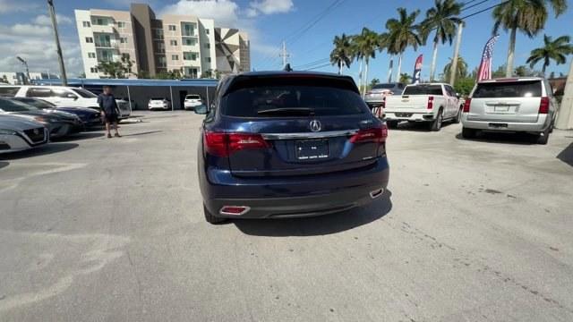 2014 Blue Acura MDX (5FRYD4H49EB) with an 6 3.5 L engine, Automatic transmission, located at 27610 S Dixie Hwy, Homestead, FL, 33032, (305) 749-2348, 25.510241, -80.438301 - IIHS Top Safety Pick+. Only 96,714 Miles! Boasts 27 Highway MPG and 18 City MPG! This Acura MDX boasts a Premium Unleaded V-6 3.5 L/212 engine powering this Automatic transmission. Window Grid Antenna, Voice Activated Dual Zone Front Automatic Air Conditioning, Vehicle Stability Assist Electronic St - Photo#3