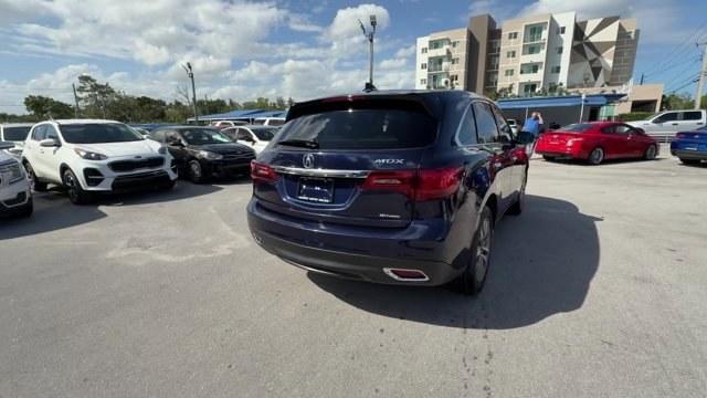 2014 Blue Acura MDX (5FRYD4H49EB) with an 6 3.5 L engine, Automatic transmission, located at 27610 S Dixie Hwy, Homestead, FL, 33032, (305) 749-2348, 25.510241, -80.438301 - IIHS Top Safety Pick+. Only 96,714 Miles! Boasts 27 Highway MPG and 18 City MPG! This Acura MDX boasts a Premium Unleaded V-6 3.5 L/212 engine powering this Automatic transmission. Window Grid Antenna, Voice Activated Dual Zone Front Automatic Air Conditioning, Vehicle Stability Assist Electronic St - Photo#4