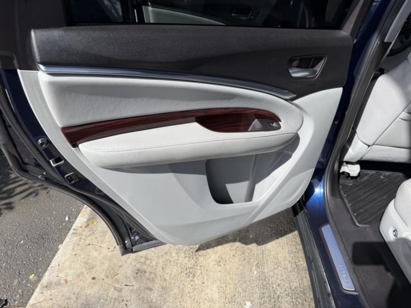 2014 Blue Acura MDX (5FRYD4H49EB) with an 6 3.5 L engine, Automatic transmission, located at 27610 S Dixie Hwy, Homestead, FL, 33032, (305) 749-2348, 25.510241, -80.438301 - IIHS Top Safety Pick+. Only 96,714 Miles! Boasts 27 Highway MPG and 18 City MPG! This Acura MDX boasts a Premium Unleaded V-6 3.5 L/212 engine powering this Automatic transmission. Window Grid Antenna, Voice Activated Dual Zone Front Automatic Air Conditioning, Vehicle Stability Assist Electronic St- Photo#14