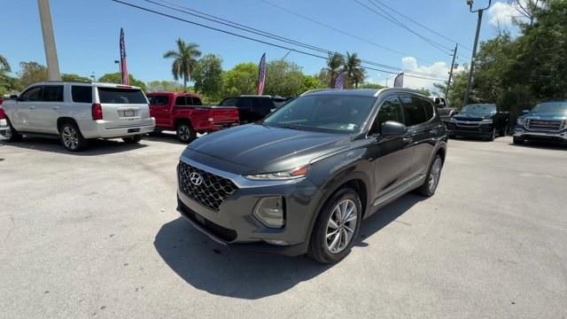 2020 Portofino Gray /Black/Black Hyundai Santa Fe (5NMS33AD0LH) with an 4 2.4 L engine, Automatic transmission, located at 27610 S Dixie Hwy, Homestead, FL, 33032, (305) 749-2348, 25.510241, -80.438301 - Boasts 29 Highway MPG and 22 City MPG! This Hyundai Santa Fe boasts a Regular Unleaded I-4 2.4 L/144 engine powering this Automatic transmission. FIRST AID KIT, CARPETED FLOOR MATS, Wireless Phone Connectivity.*This Hyundai Santa Fe Comes Equipped with These Options *Wheels w/Silver Accents, Variabl - Photo#0