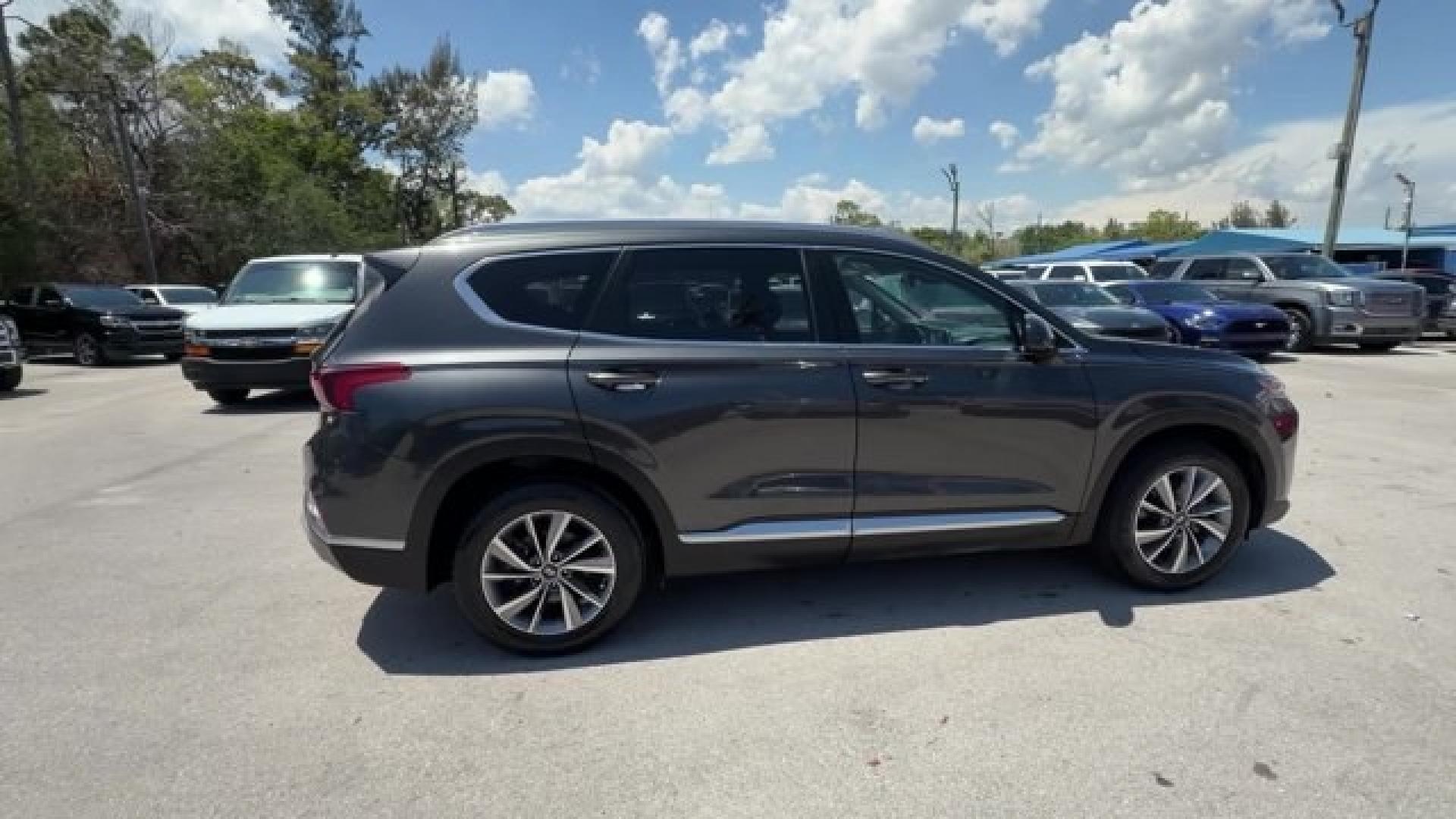 2020 Portofino Gray /Black/Black Hyundai Santa Fe (5NMS33AD0LH) with an 4 2.4 L engine, Automatic transmission, located at 27610 S Dixie Hwy, Homestead, FL, 33032, (305) 749-2348, 25.510241, -80.438301 - Boasts 29 Highway MPG and 22 City MPG! This Hyundai Santa Fe boasts a Regular Unleaded I-4 2.4 L/144 engine powering this Automatic transmission. FIRST AID KIT, CARPETED FLOOR MATS, Wireless Phone Connectivity.*This Hyundai Santa Fe Comes Equipped with These Options *Wheels w/Silver Accents, Variabl- Photo#5