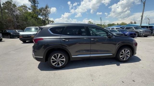2020 Portofino Gray /Black/Black Hyundai Santa Fe (5NMS33AD0LH) with an 4 2.4 L engine, Automatic transmission, located at 27610 S Dixie Hwy, Homestead, FL, 33032, (305) 749-2348, 25.510241, -80.438301 - Boasts 29 Highway MPG and 22 City MPG! This Hyundai Santa Fe boasts a Regular Unleaded I-4 2.4 L/144 engine powering this Automatic transmission. FIRST AID KIT, CARPETED FLOOR MATS, Wireless Phone Connectivity.*This Hyundai Santa Fe Comes Equipped with These Options *Wheels w/Silver Accents, Variabl - Photo#5