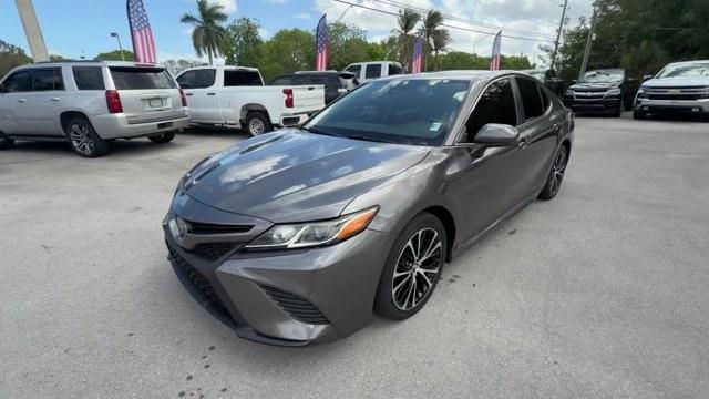 2019 Gray Toyota Camry (4T1B11HK7KU) with an 4 2.5 L engine, Automatic transmission, located at 27610 S Dixie Hwy, Homestead, FL, 33032, (305) 749-2348, 25.510241, -80.438301 - KBB.com 10 Best Sedans Under $30,000. This Toyota Camry boasts a Regular Unleaded I-4 2.5 L/152 engine powering this Automatic transmission. Wireless Phone Connectivity, Window Grid And Roof Mount Antenna, Variable Intermittent Wipers.*This Toyota Camry Comes Equipped with These Options *Valet Funct - Photo#0